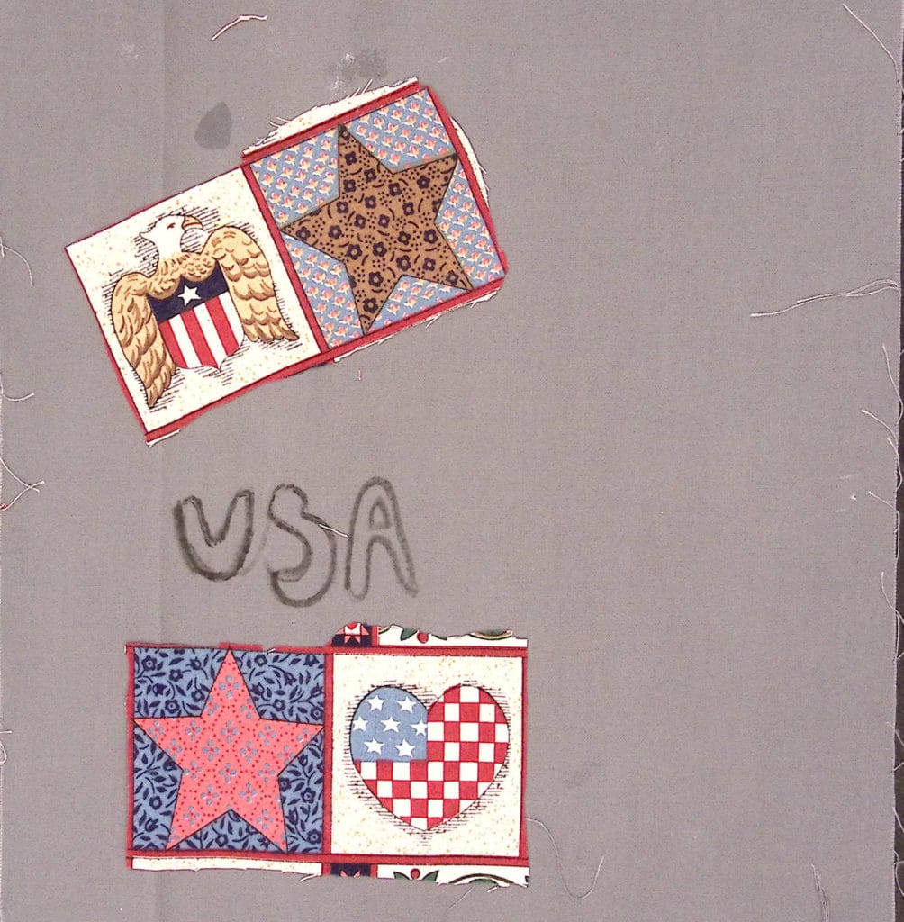 Gray square with American flag heart and star, with "USA"