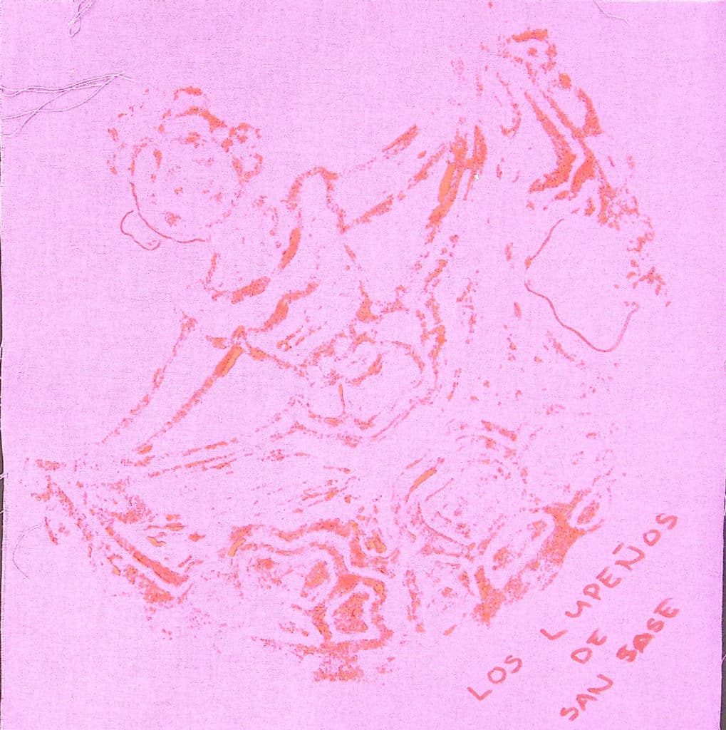 A pink square with a red stamped design of a dancer.