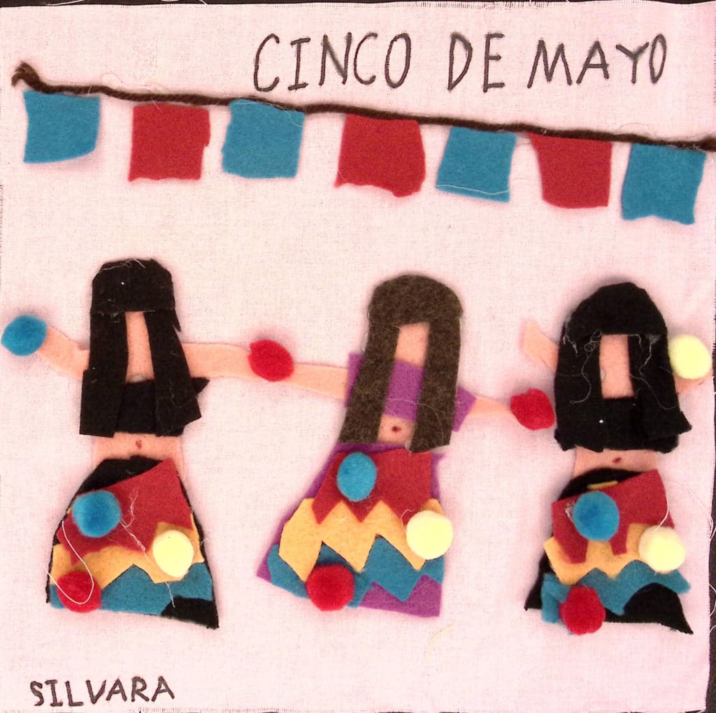 Three dancers with blue, yellow and red skirts, red and blue papel picados, and the words "Cinco de Mayo."