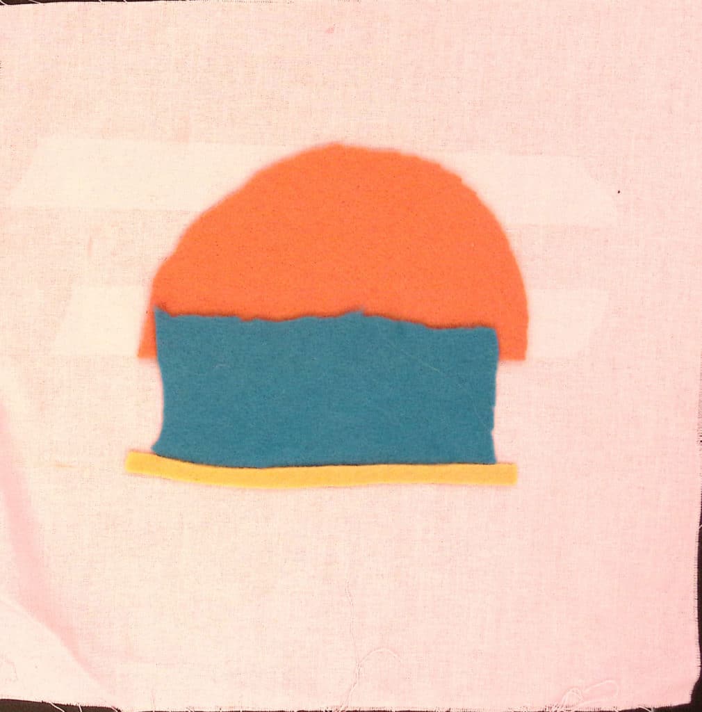 A yellow and blue rectangle topped with an orange half circle on a pink background