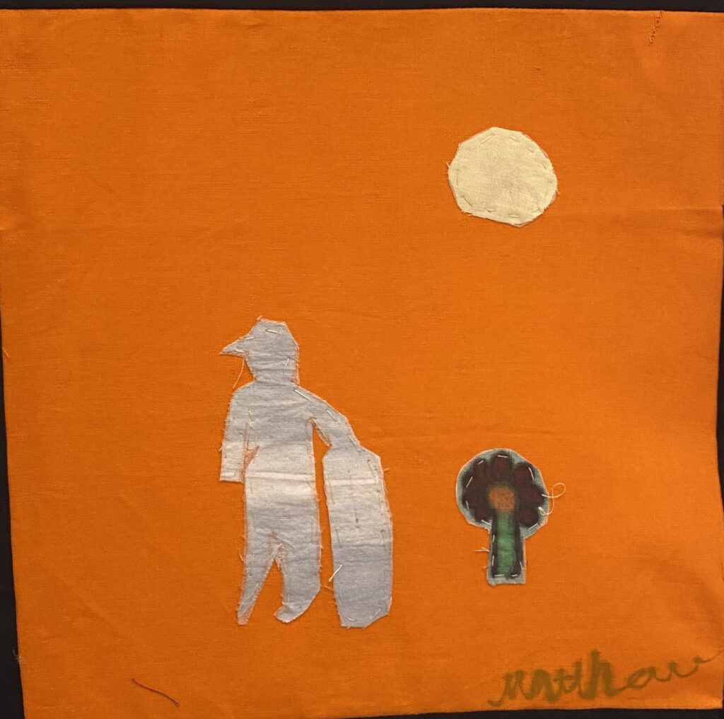 A gray silhouette of a boy holding a skateboard with a flower on an orange square.