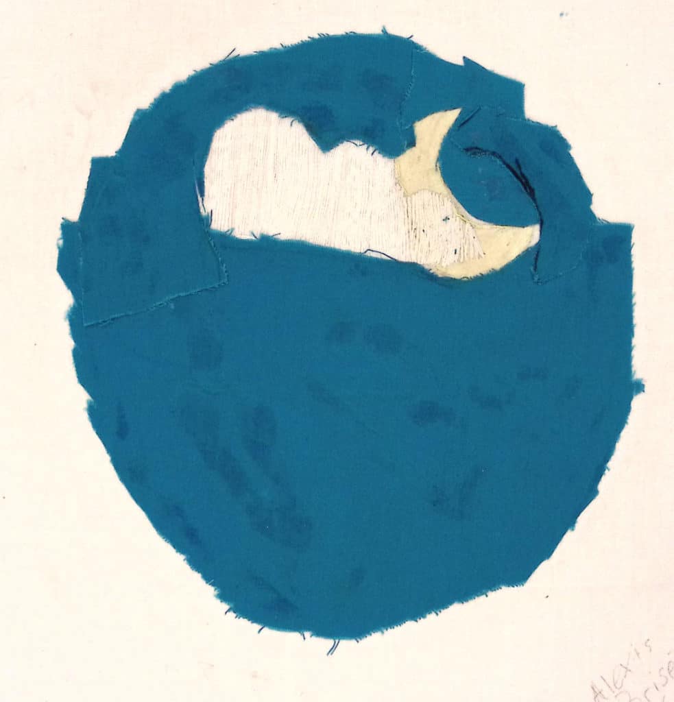 A blue circle on a white background with embroidered cloud and moon.