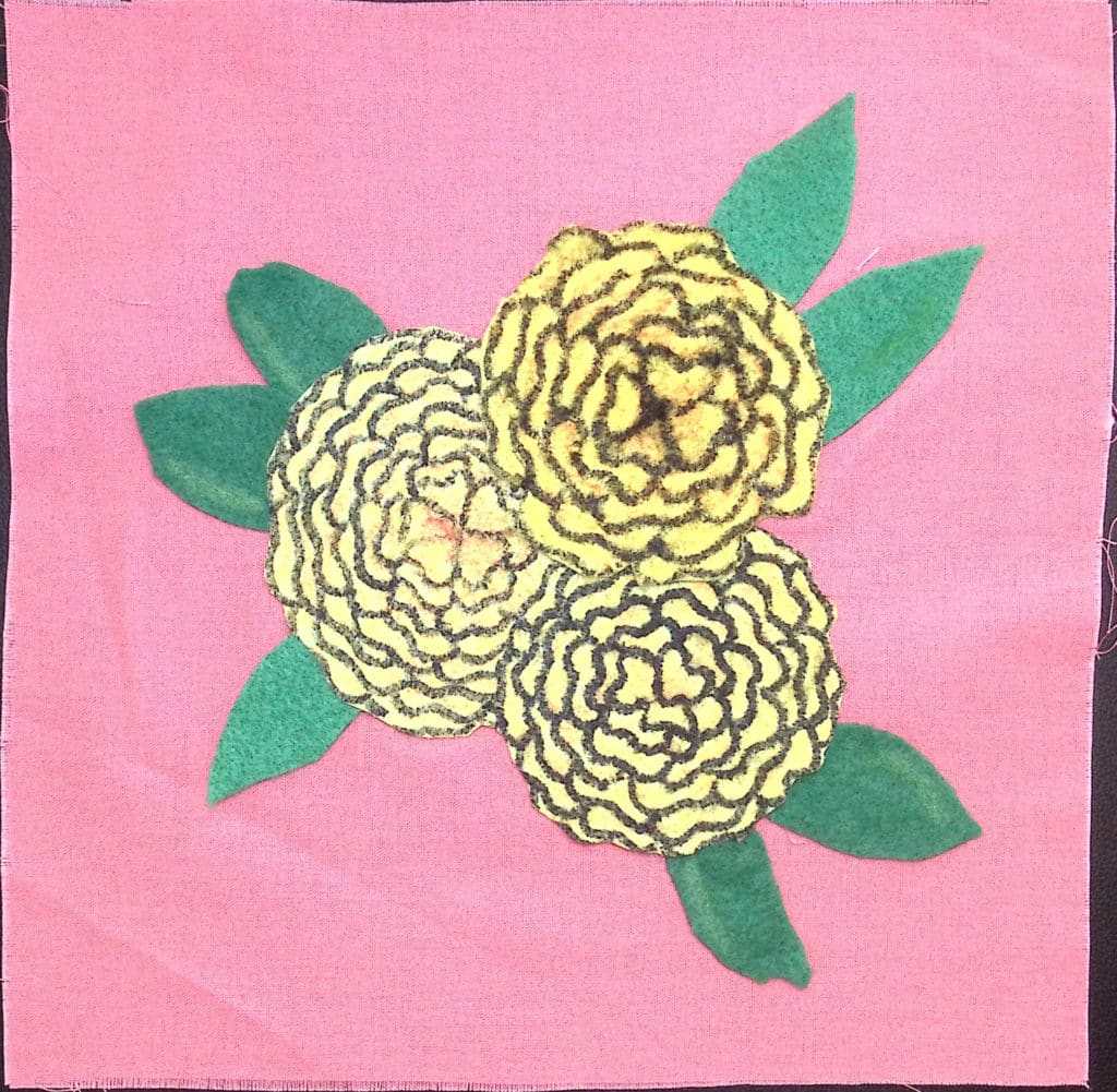 Yellow marigolds on a pink background