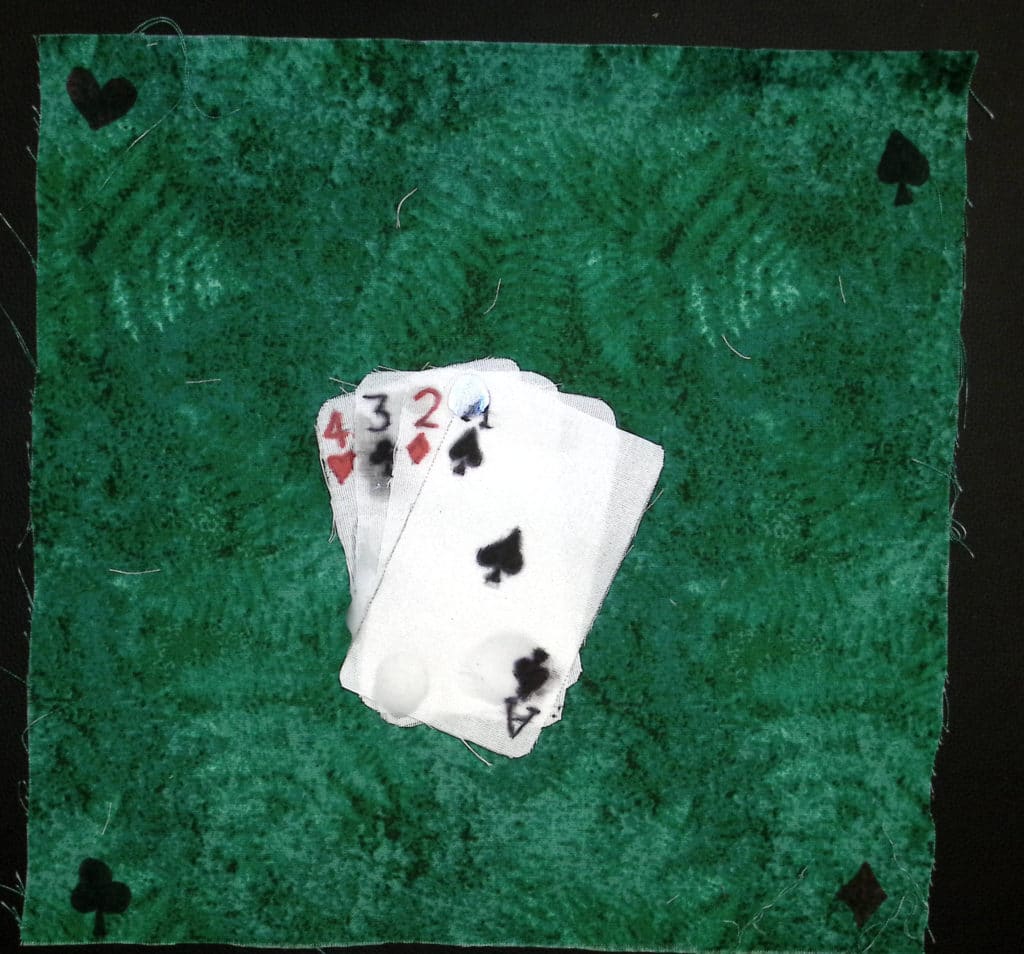 Playing cards on a green background