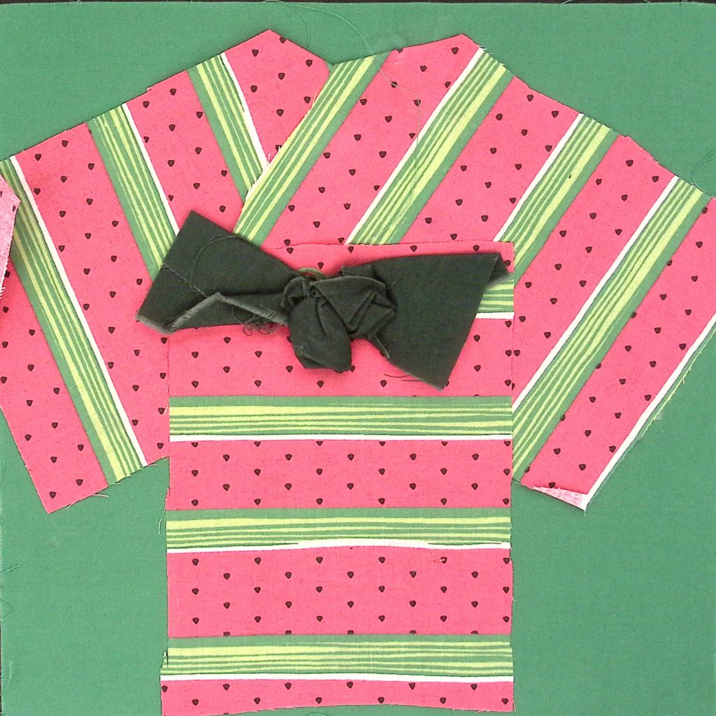 A dress or kimono made with watermelon stripes and a dark green bow