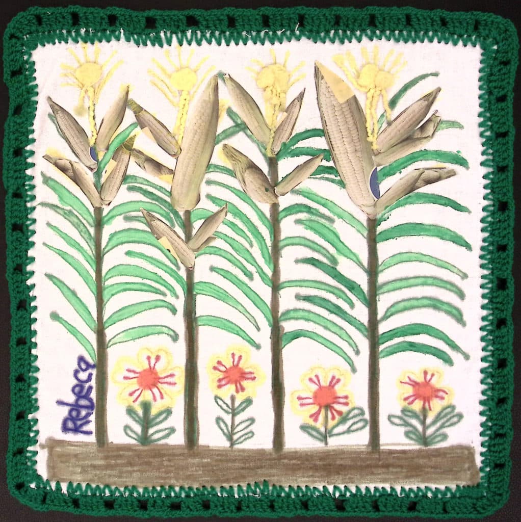 Corn stalks, flowers, green border