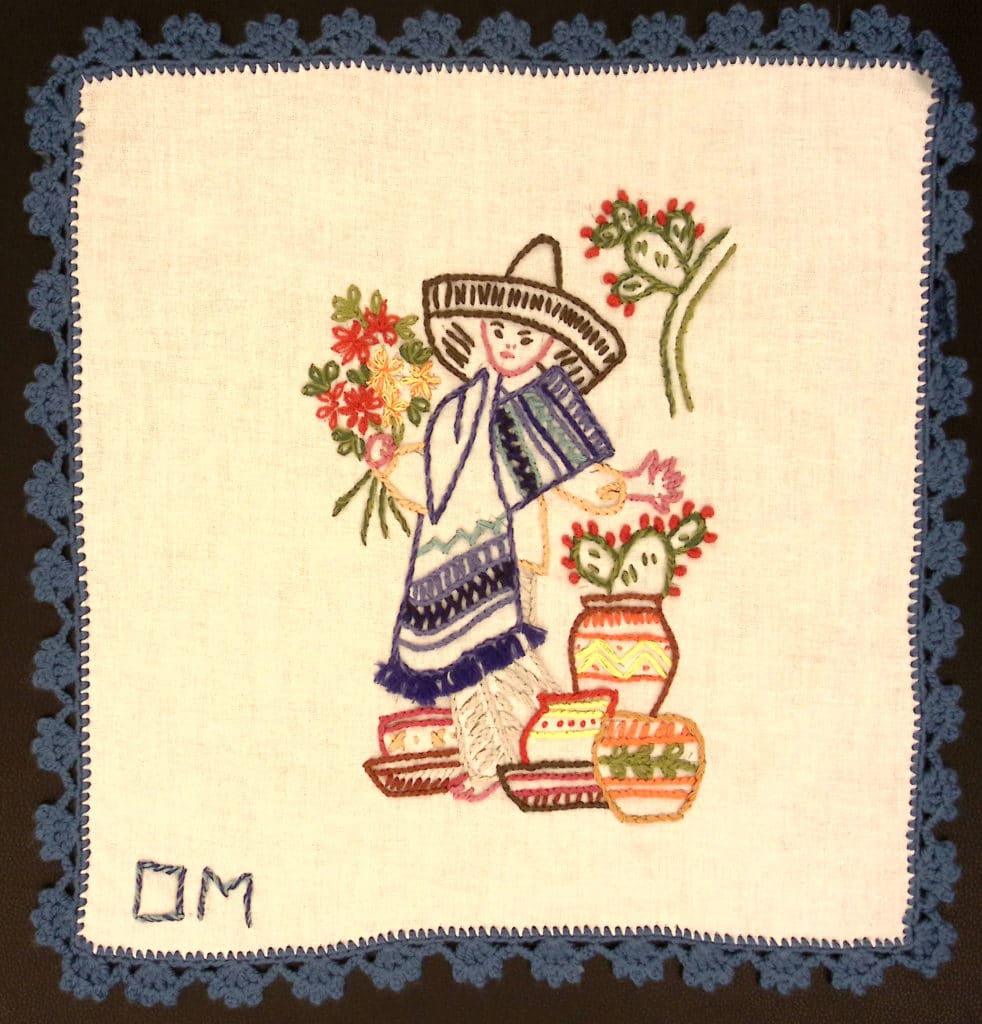 Light blue border, boy in Mexican traditional clothing