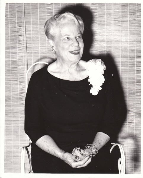 Portrait of Ivy Loeber sitting in a chair.