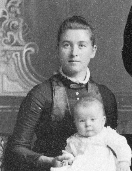 Sophie Alstrom Mitchell holding one of her sons as an infant.