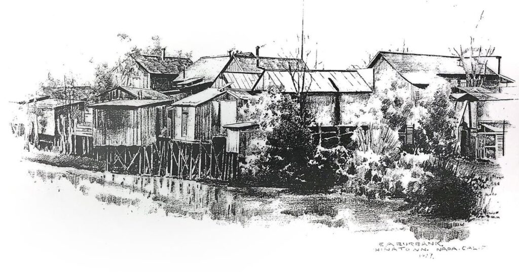 Pencil sketch of Napa's Chinatown along the Napa River in 1927, the buildings are raised above the river by stilts.