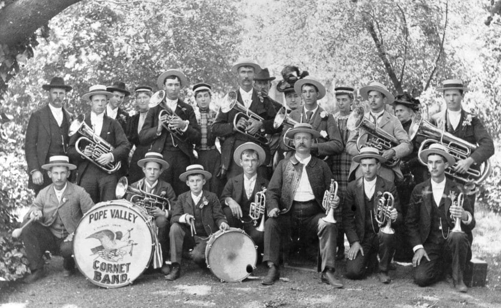 The Pope Valley Cornet Band, several men posed in a group photograph with brass instruments and drums.