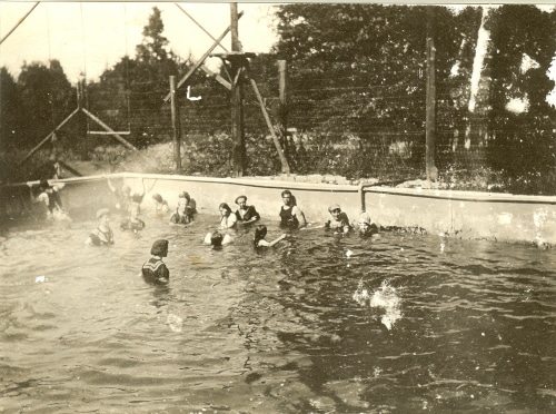 People in the pool at Woodworth Resort.