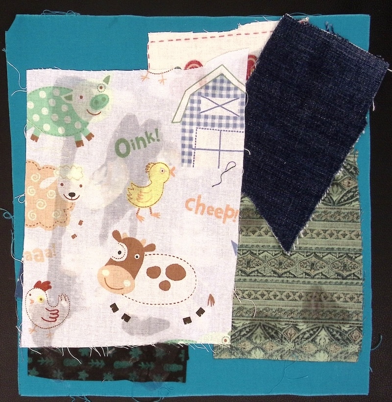 Blue square with denim and farm animals