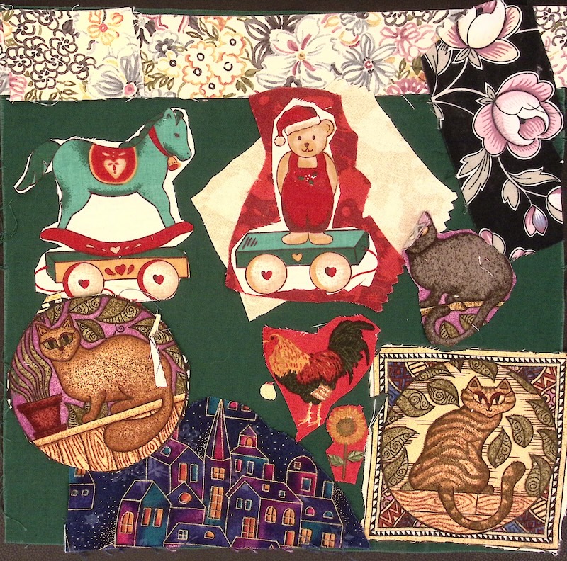 Green square with a rocking horse, teddy bear in a Santa hat, and floral border. There are three cats, a chicken, and a town.