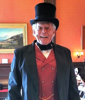 Photograph of Don Winter in 19th century costume and tophat at NCHS Annual Meeting, 2024