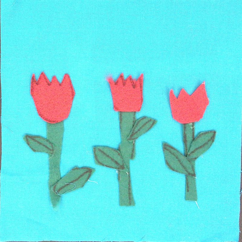 Blue square with red tulips