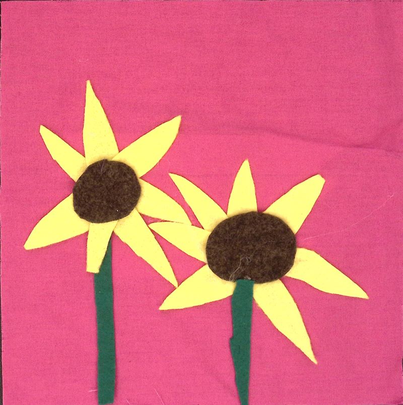 Pink square with tall yellow flowers.