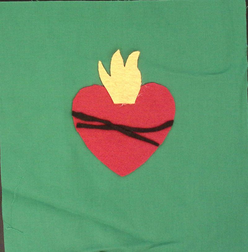 Green square with a red heart, topped with a yellow crown.